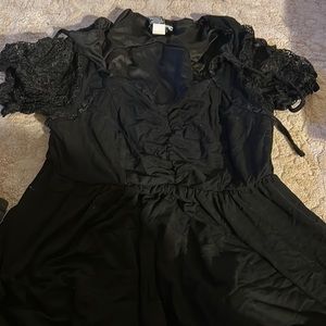 Black hot topic dress with lace sleeve. Size small